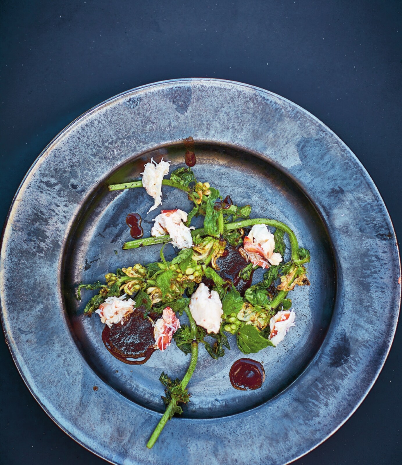 Grilled nettles with brown crab and bisque