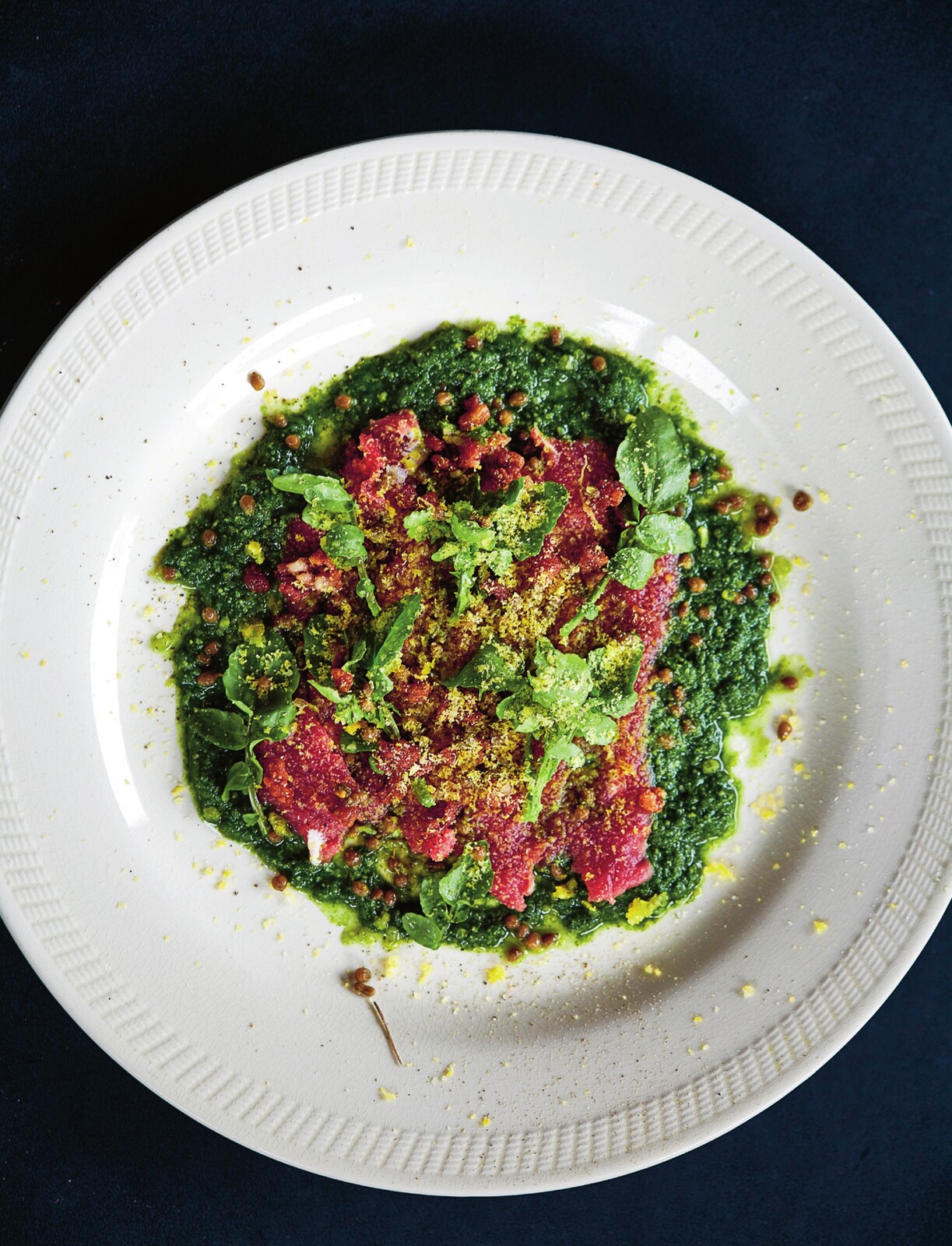 Tartare, salted egg yolk, watercress puree, cracklings and pickled elderberry capers